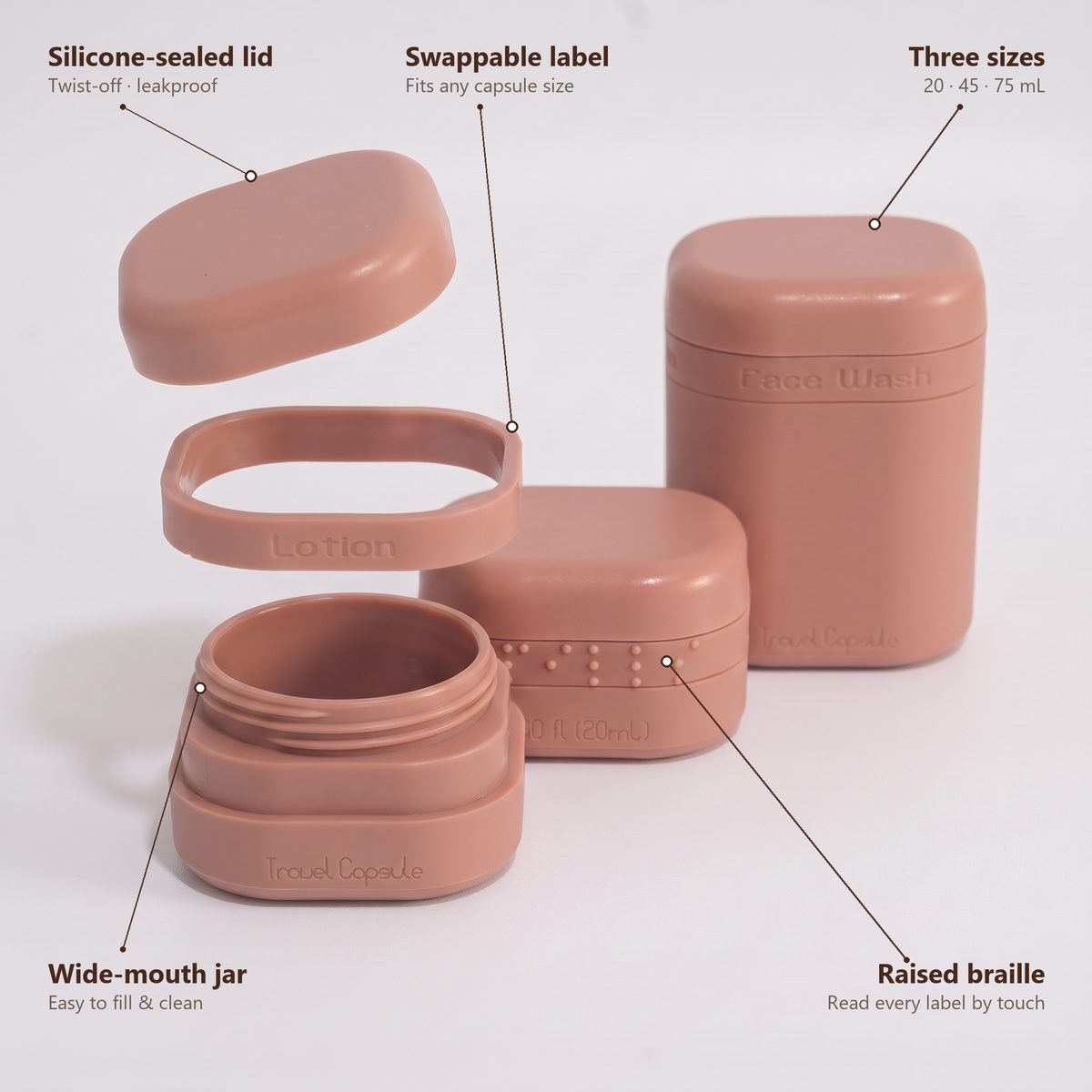 Exploded view of a Travel Capsule: silicone-sealed lid, swappable label, wide-mouth jar, raised braille and three sizes